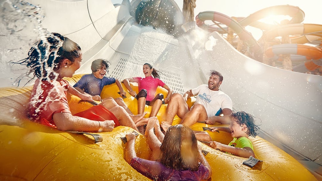 People enjoying Falcons Falaj water ride at YAS Waterworld, Abu Dhabi.