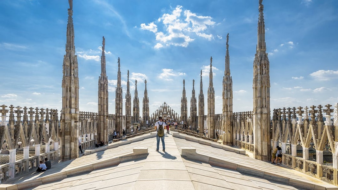Rooftop view of Milan Cathedral with spires, part of the Official Milano Pass experience.