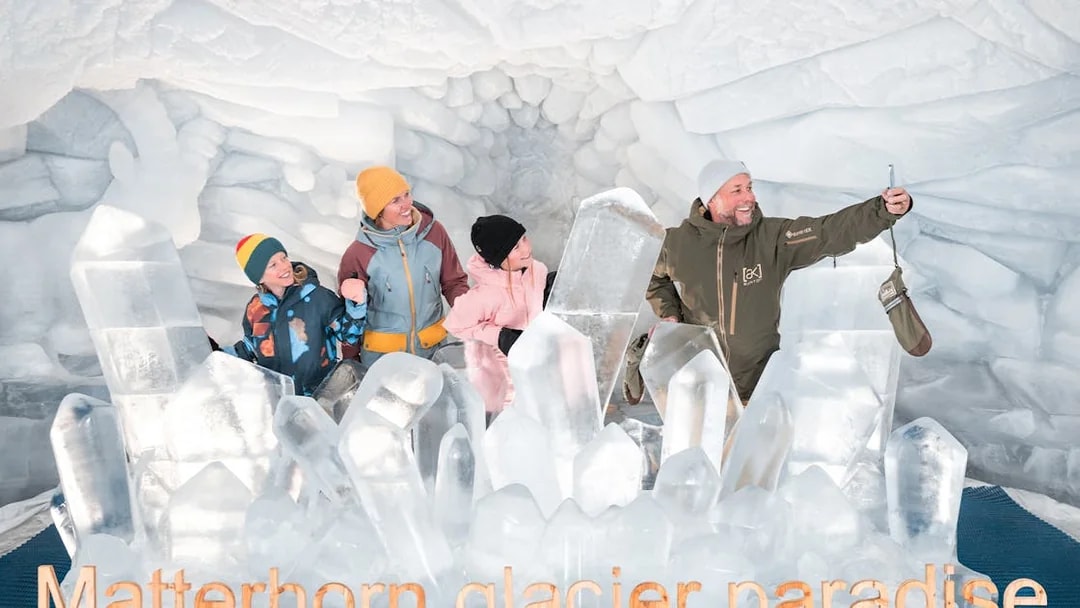 Visitors exploring ice sculptures at Matterhorn Glacier Paradise.
